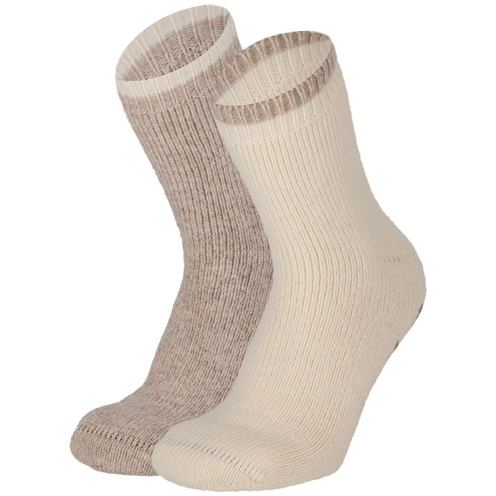 Step into a world of warmth and eco-conscious luxury with our sustainable alpaca house socks. Made from high-quality, ethically sourced alpaca wool, these socks provide exceptional comfort while being kind to the environment. Perfect for cozying up at home or gifting to a loved one, these socks are a must-have for those who prioritize sustainability without sacrificing comfort.