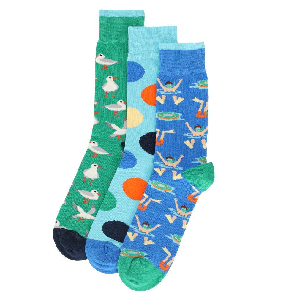 Discover three pairs of vibrant cotton socks that instantly brighten up your daily wardrobe. Crafted from 100% pure cotton, they deliver a soft, breathable fit ideal for all-day comfort. The durable, high-quality prints retain their brilliance even after many washes. These unisex socks are designed to stay in place without squeezing, making them a perfect fusion of style and functionality.