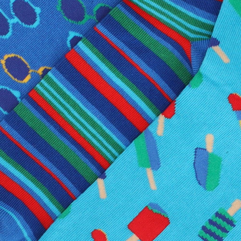 Discover three pairs of vibrant cotton socks that instantly brighten up your daily wardrobe. Crafted from 100% pure cotton, they deliver a soft, breathable fit ideal for all-day comfort. The durable, high-quality prints retain their brilliance even after many washes. These unisex socks are designed to stay in place without squeezing, making them a perfect fusion of style and functionality.